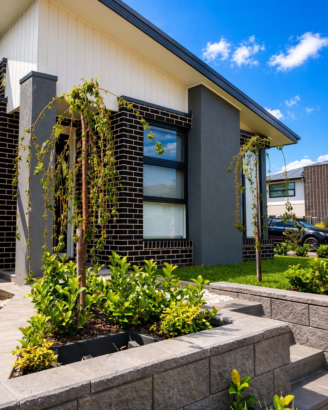 Modern home with raised planter beds